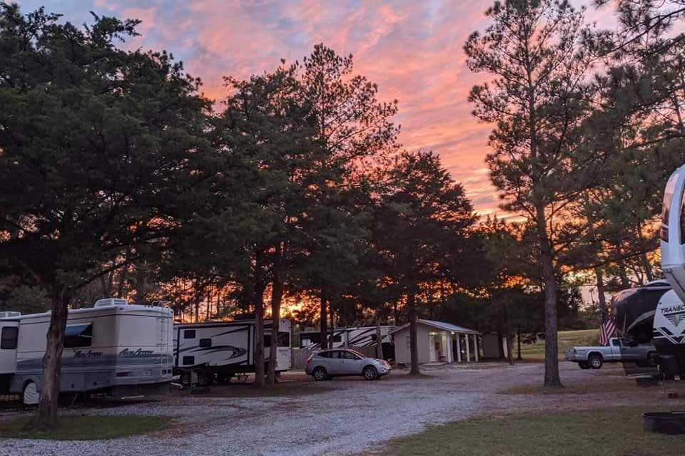 Sapphire Island RV park with rvs parked at sunset. 