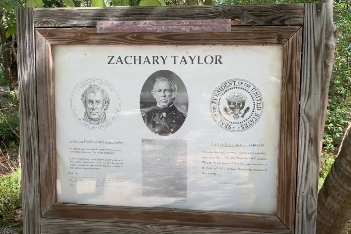 Sign with images of a man, the US seal, and the wors Zachary Taylor. 
