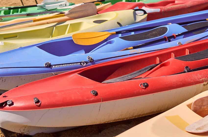 Kayaks in a variety of colors. 