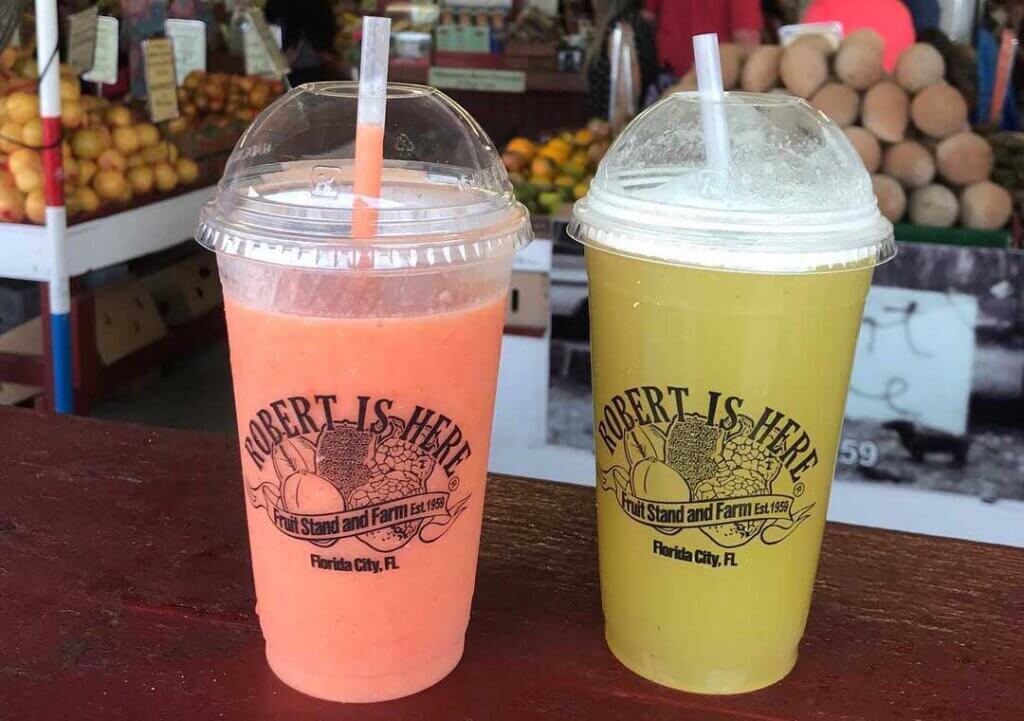 Two milkshakes ina "Robert is Here" cup at the Robert is Here farmer's market in Florida