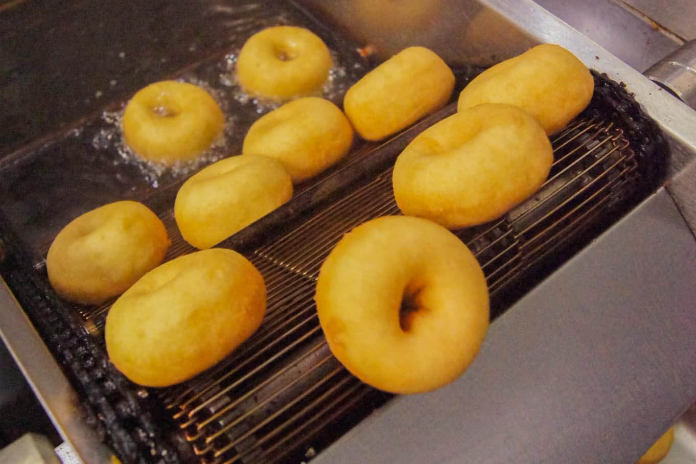 Donuts being made at Charlie's Mini Donut Shop.