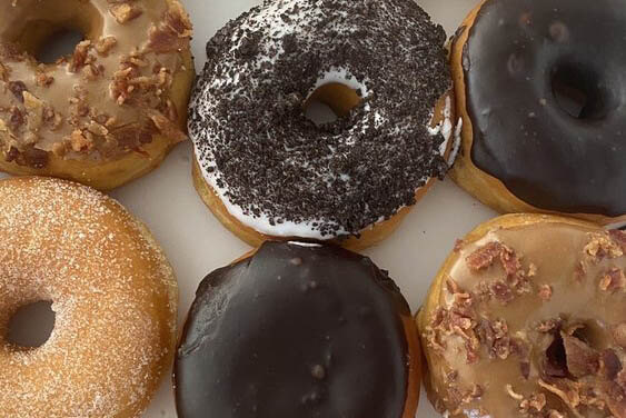 Donuts with a variety of toppings. 