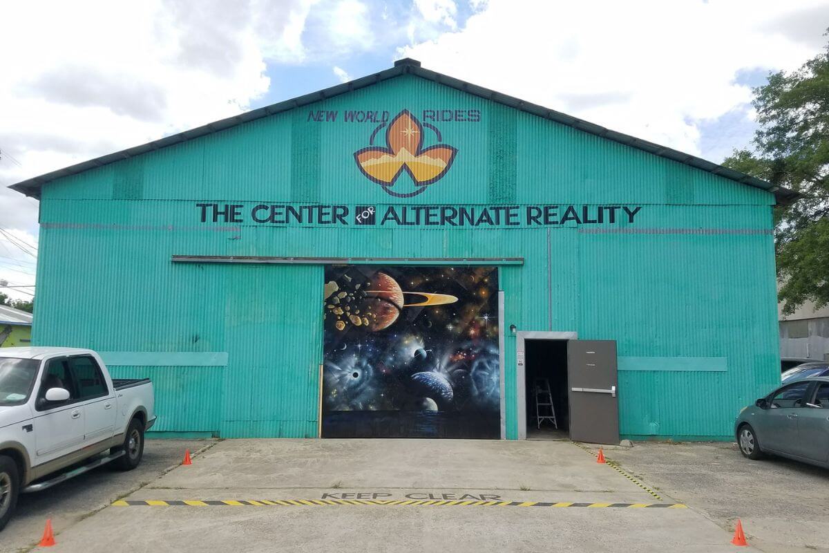 Exterior of a building that reads The Center for Alternate Reality. 