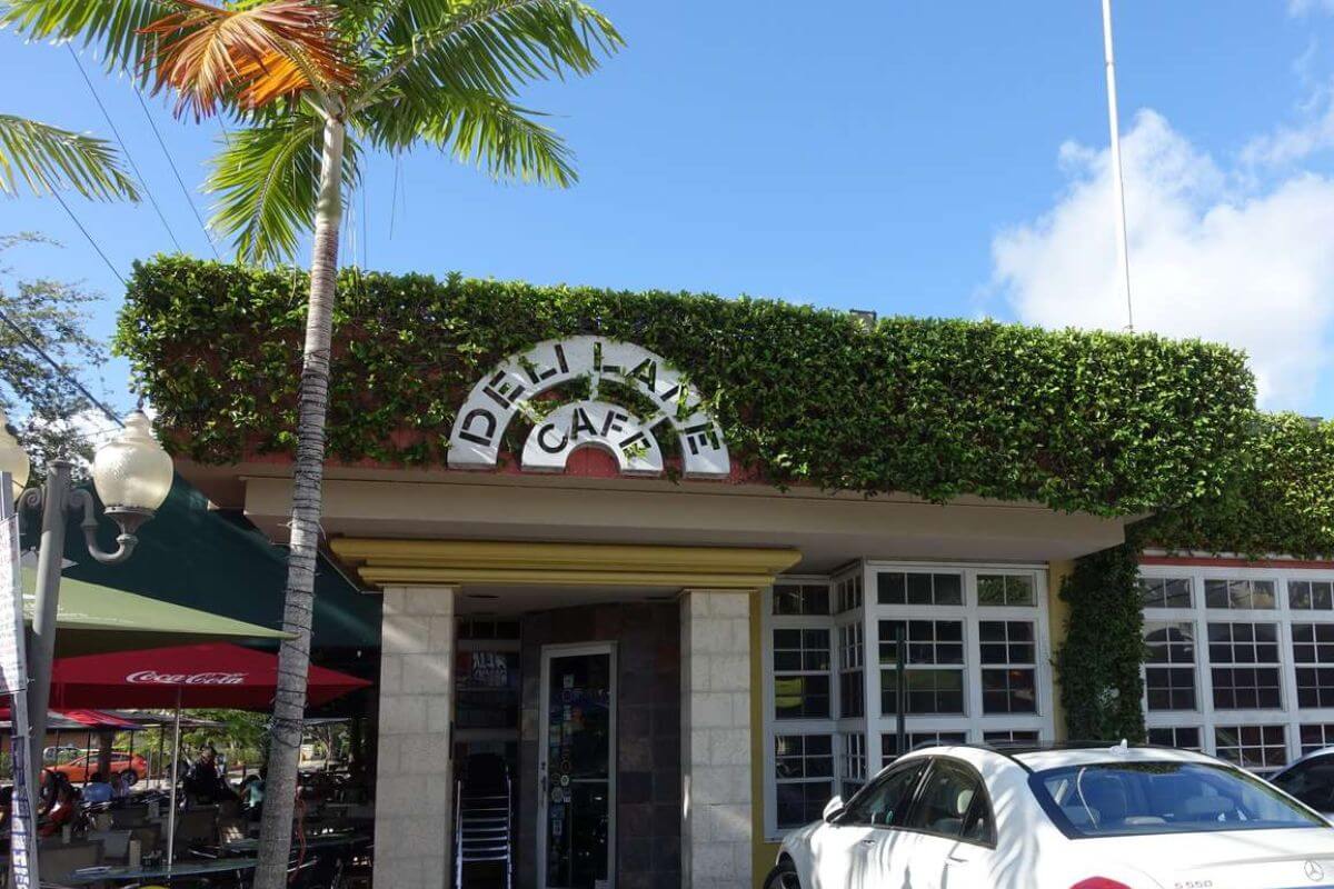 Exterior of a restaurant with the words Deli Lane Cafe. 