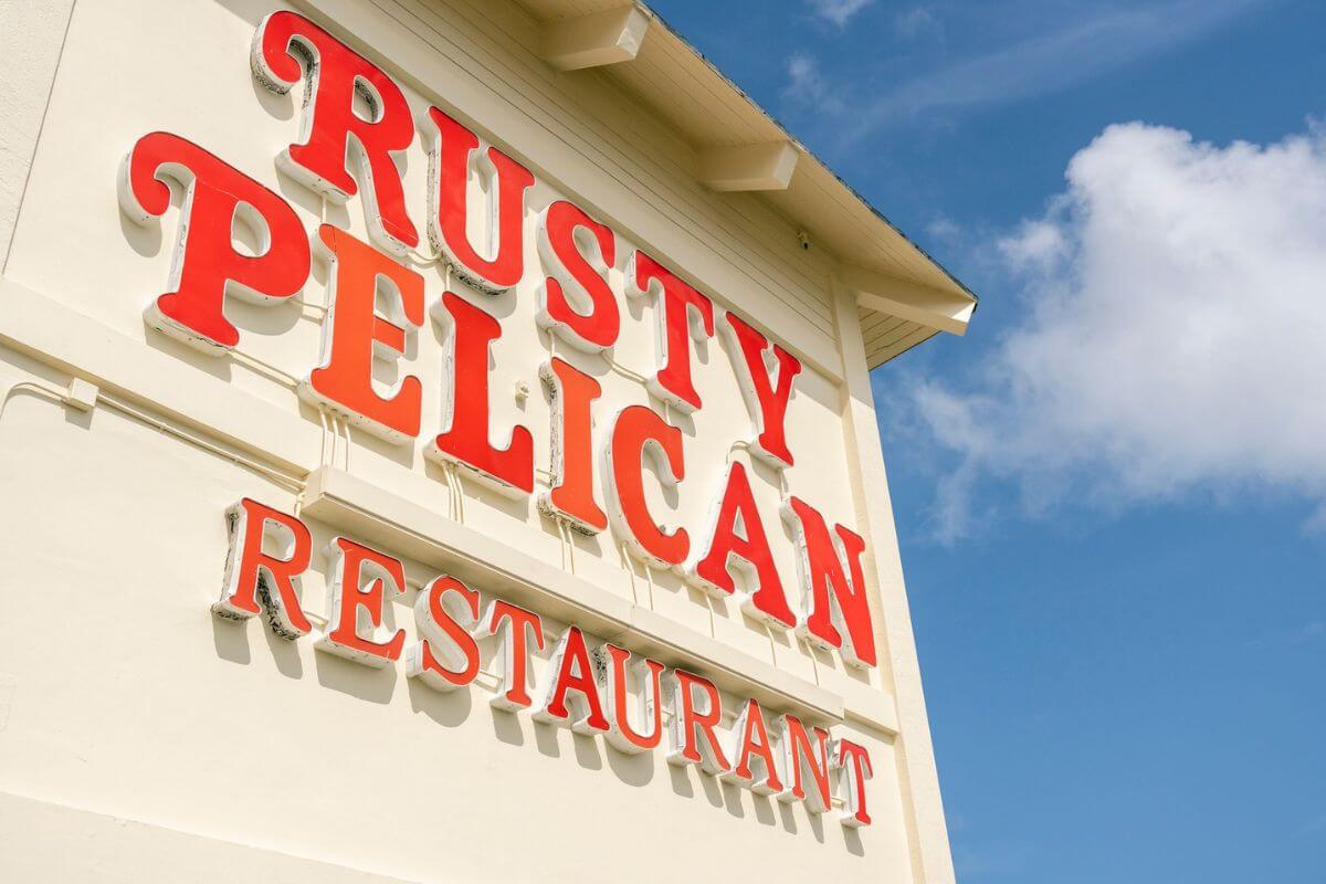 Restaurant sign reading Rusty Pelican Restaurant. 