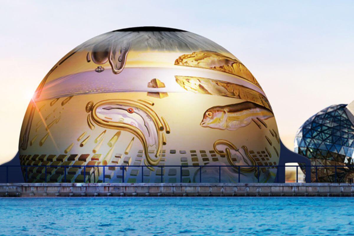 Dome exterior with Dali's art projected on it. 
