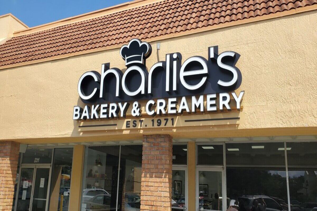 Bakery exterior with words that read Charlie's Bakery & Creamery. 