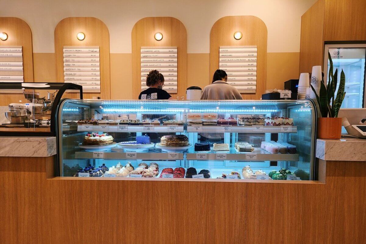 Bakery interior with a variety of baked goods. 