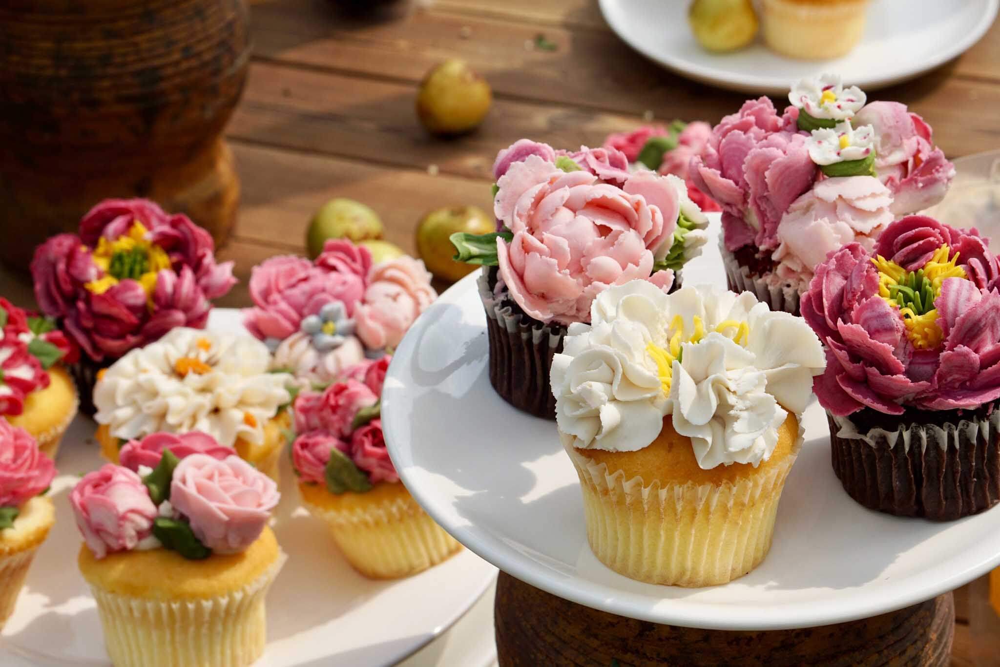Cupcakes with flowers on the top. 