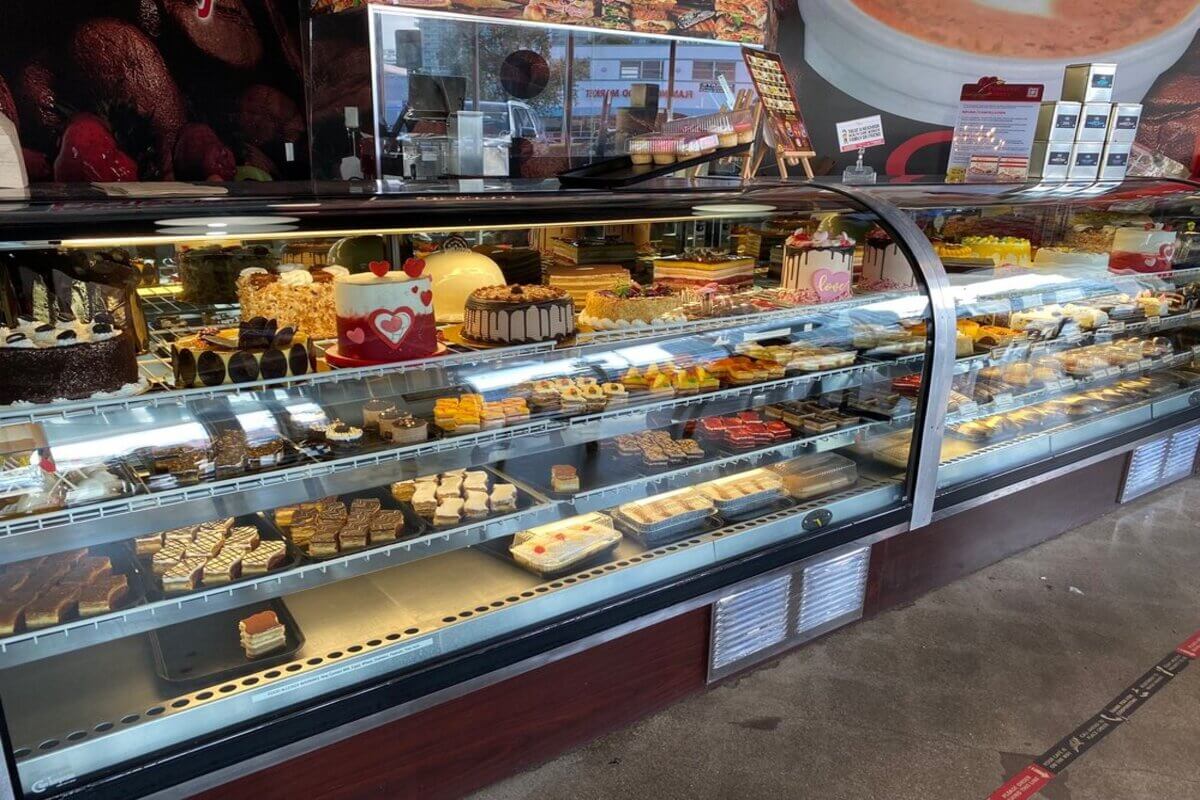 Bakery display case with a variety of desserts. 
