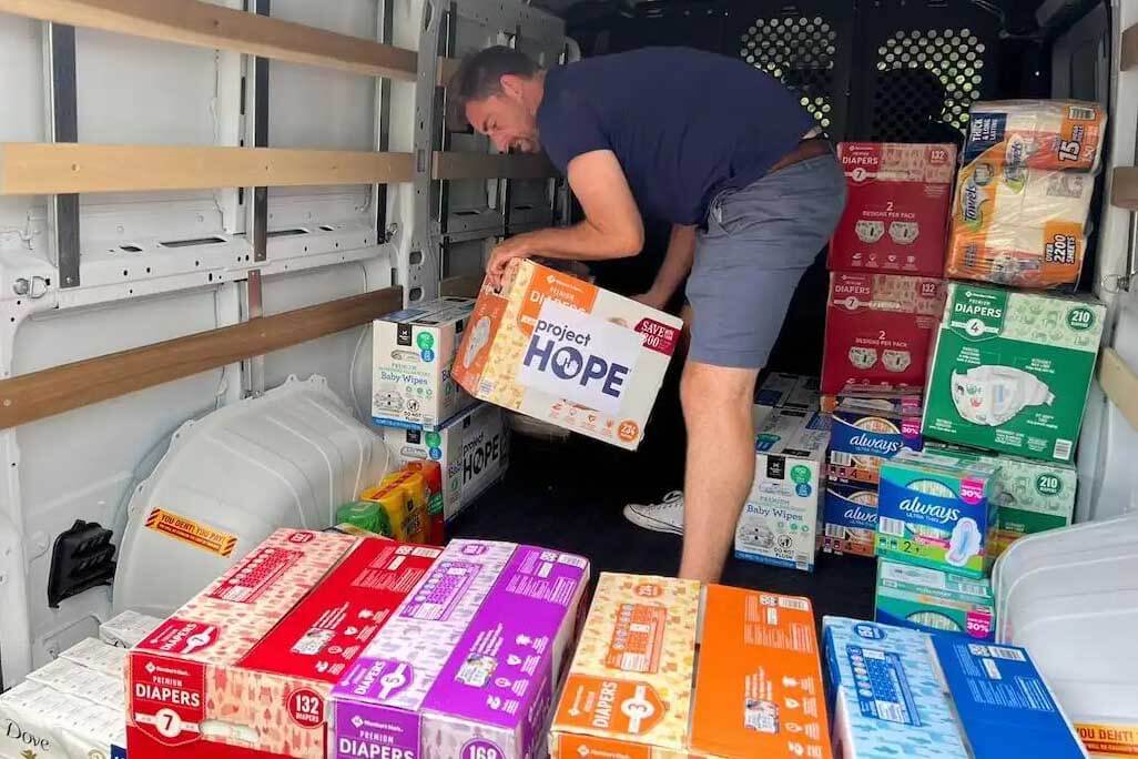Man unloading boxes for Project Hope 