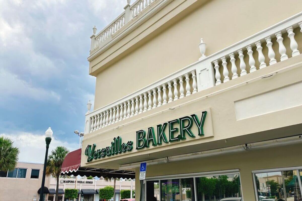 Bakery exterior with the words Versailles Bakery. 