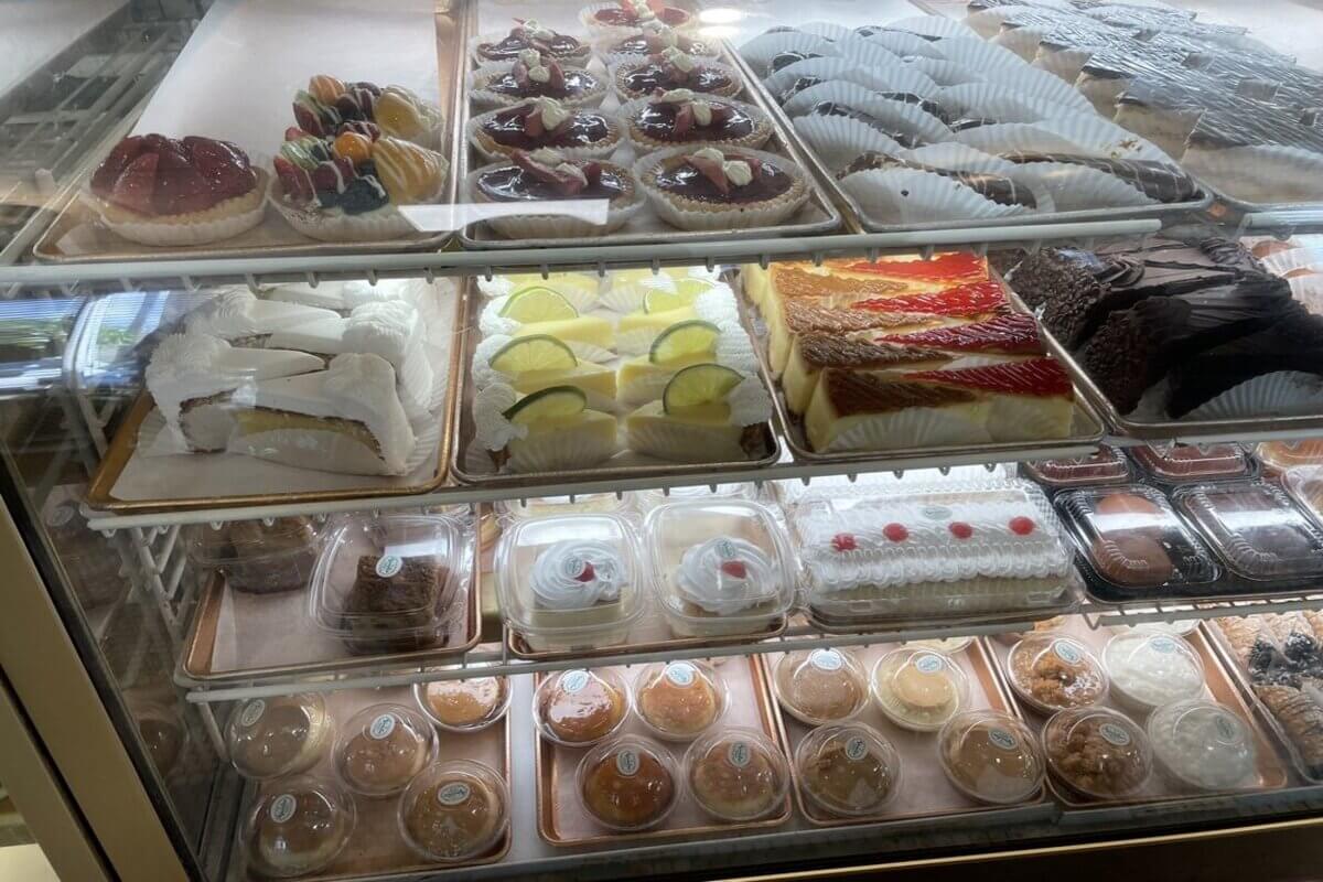 Bakery case with a variety of desserts. 