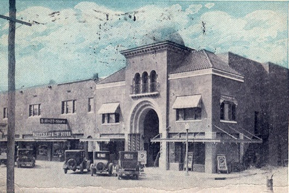Old postcard of building. 