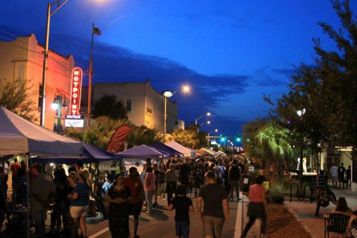 People walking at an event in downtown Titusville. 