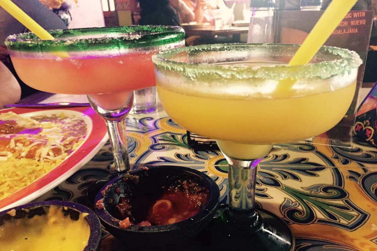 Margaritas in glasses on a table. 