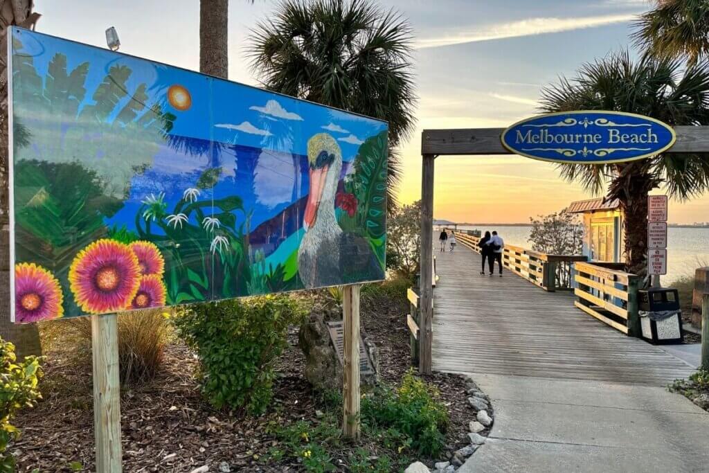 Mural sign in front of Melbourne Beach Pier