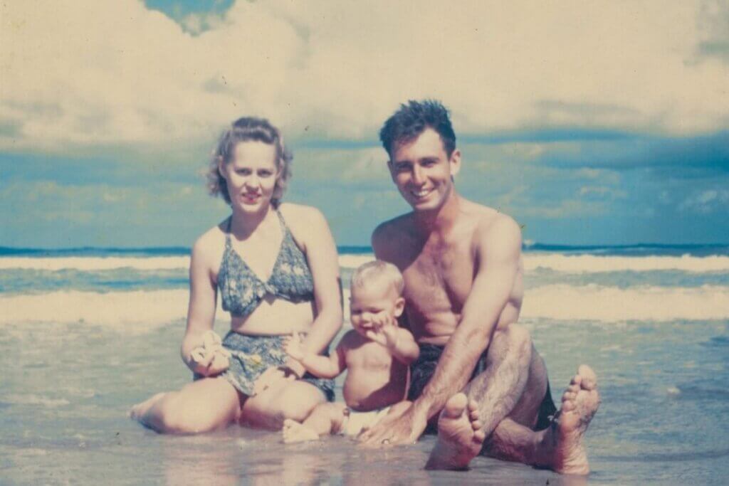 Steve and Clara Morrison with their baby Jim Morrison on the beach in 1944