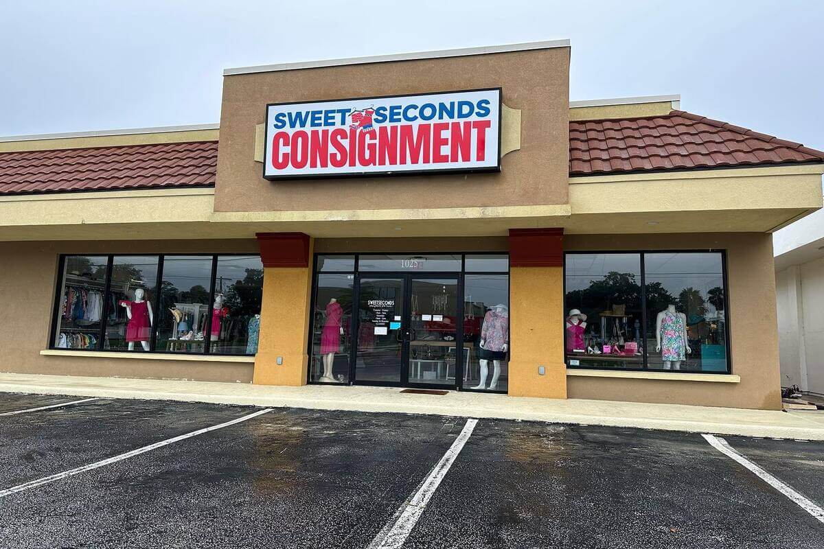Shop exterior with a sign that reads Sweet Seconds Consignment. 