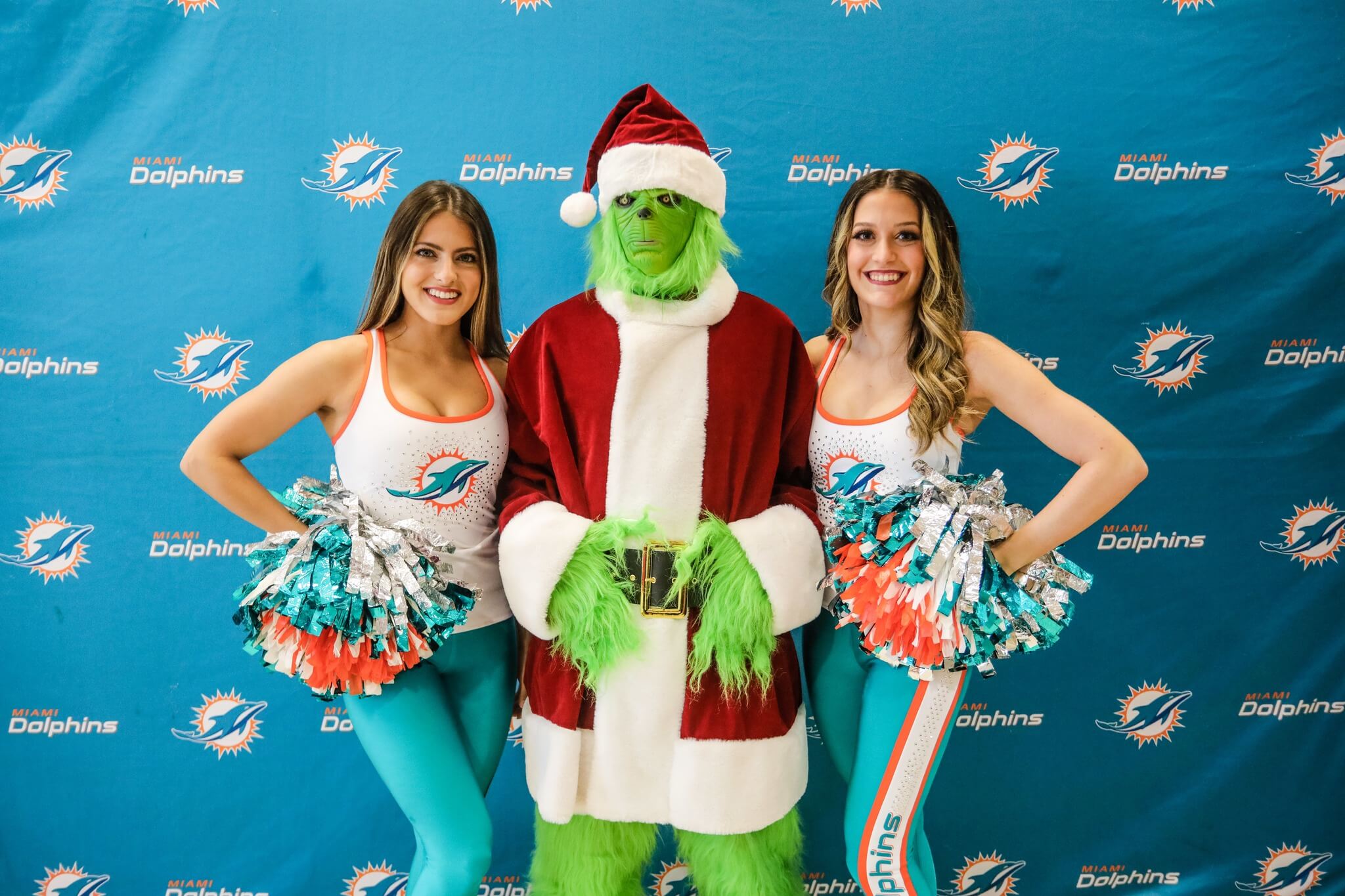 Grinch and cheerleaders