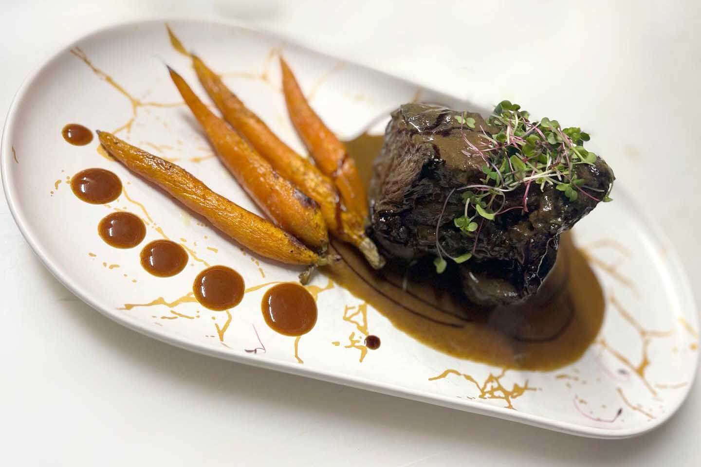 Katya Vineyards beef and carrots on a plate.