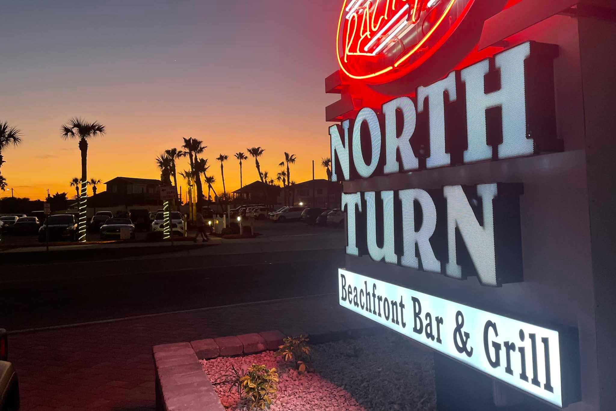Sign that reads North Turn Beachfront Bar and Grill.  
