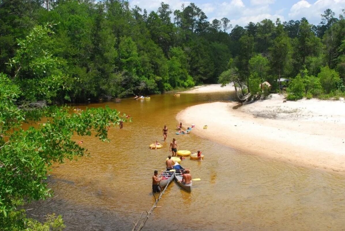 tubes and canoes in river